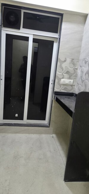 Kitchen in 2 BHK Apartment at Aarti Building, Thane West – for Rent