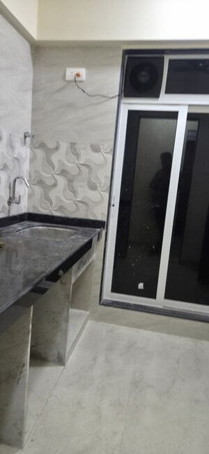 Kitchen in 2 BHK Apartment at Aarti Building, Thane West – for Rent