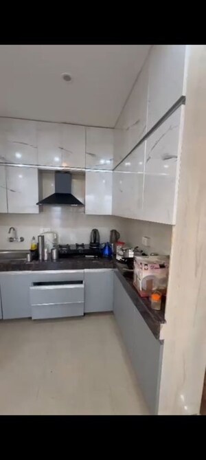 Kitchen in 2 BHK Apartment at Suncity Avenue 76, Sector 76 – for Rent