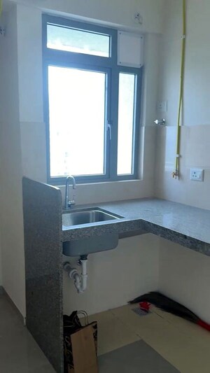 Kitchen in 2 BHK Apartment at Piramal Vaikunth, Balkum Pada – for Rent