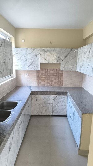 Kitchen in 3 BHK Apartment at Terra Heritage, Alwar Bypass Road – for Sale
