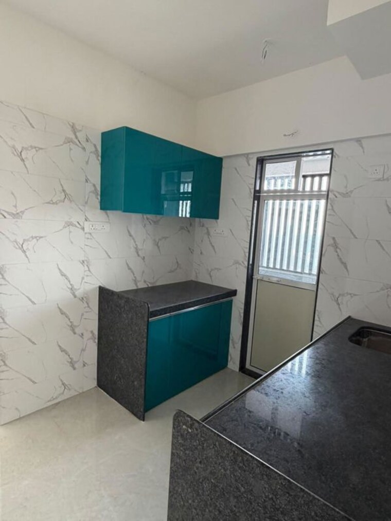 Kitchen, marathon-monte-south 2 Bedroom 941 Sq.Ft. Apartment In Byculla West Mumbai 10773292