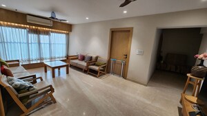 Living Room in 3 BHK Apartment at Transcon Triumph Tower 2, Andheri West – for Rent