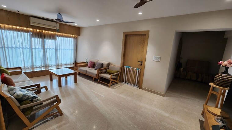 Living Room, transcon-triumph-tower-2 3 Bedroom 903 Sq.Ft. Apartment In Andheri West Mumbai 10773366