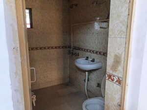 Bathroom in 3 BHK Apartment at Sarv Priya Mahajan CGHS, Sector 14 Dwarka – for Sale