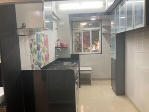 Kitchen in 1 BHK Apartment at Lalani Valentine Apartment, Malad East – for Sale