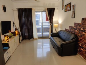 Living Room in 1 BHK Apartment at A And O Realty Eminente, Dahisar East – for Rent