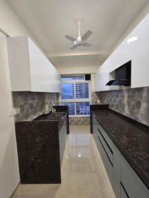 Kitchen in 2 BHK Apartment at Group Satellite Elegance, Goregaon East – for Rent
