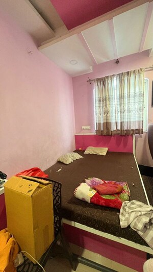 Bedroom in 2 BHK Apartment at Savali Apartments, Kharadi – for Rent