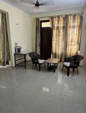 Living Room in 2 BHK Apartment at HIG Apartments, Omicron I Greater Noida – for Rent