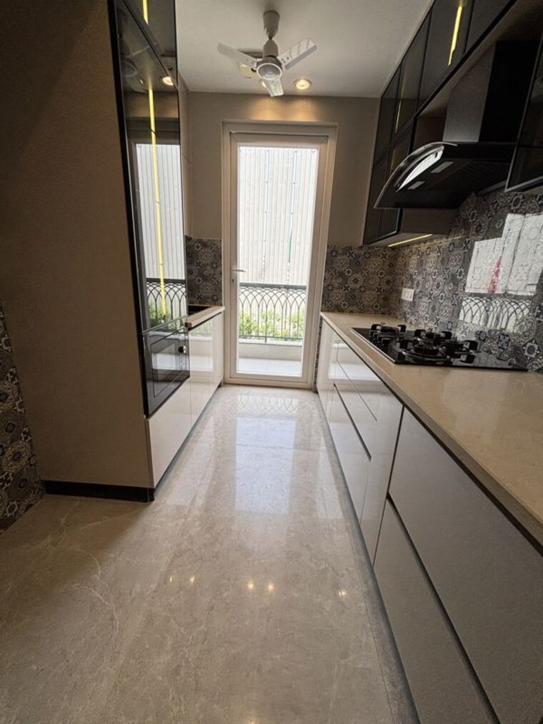 Kitchen, emaar-the-palm-drive-palm-studios 2 Bedroom 1200 Sq.Ft. Apartment In Sector 66 Gurgaon 10773756