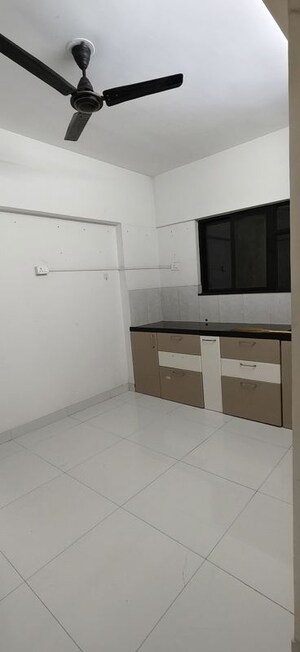 Kitchen in 1 BHK Apartment at Kumar Palaash A, Wadgaon Sheri – for Rent