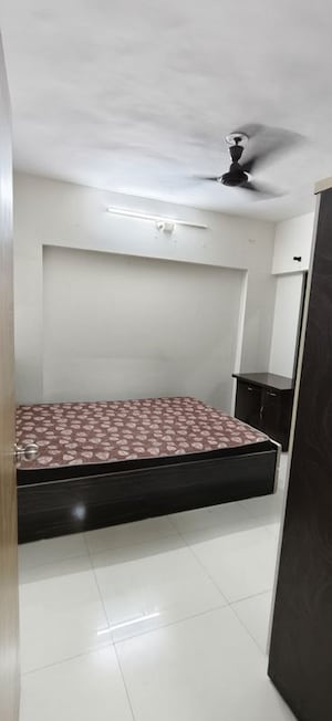 Bedroom in 1 BHK Apartment at Kumar Palaash A, Wadgaon Sheri – for Rent