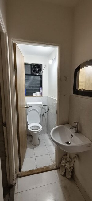 Bathroom in 1 BHK Apartment at Kumar Palaash A, Wadgaon Sheri – for Rent