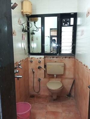 Bathroom in 1 BHK Apartment at Bhoomi Park, Malad West – for Rent