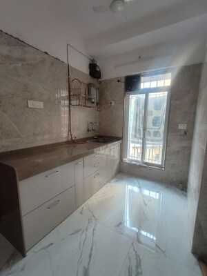 Kitchen in 1 RK Apartment at M And M Jay Shital CHS, Dahisar West – for Sale