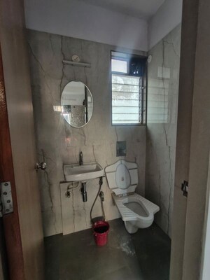 Bathroom in 1 RK Apartment at M And M Jay Shital CHS, Dahisar West – for Sale