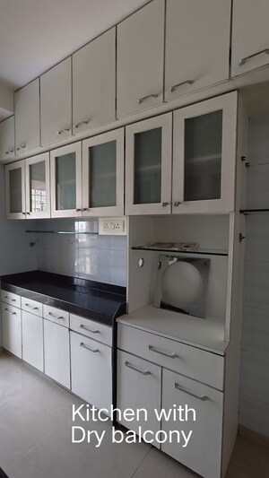 Kitchen in 2 BHK Apartment at Atul Blue Meadows, Andheri East – for Sale