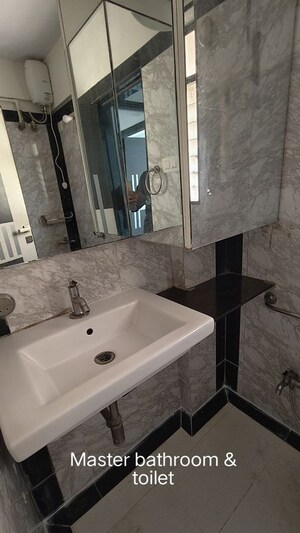 Bathroom in 2 BHK Apartment at Atul Blue Meadows, Andheri East – for Sale