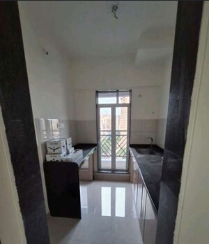 Kitchen in 2 BHK Apartment at Rosa Oasis, Thane West – for Sale