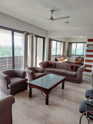 Living Room in 4 BHK Apartment at Prahlad Nagar – for Rent