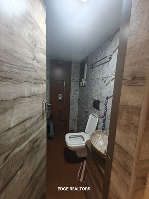 Bathroom in 3 BHK Apartment at Tilak Nagar – for Sale