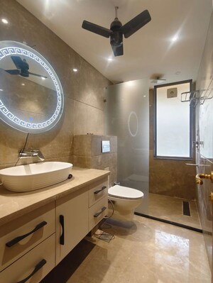 Bathroom in 4 BHK Apartment at Tata Raheja Raisina Residency, Sector 59 – for Sale