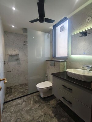 Kitchen in 4 BHK Apartment at Tata Raheja Raisina Residency, Sector 59 – for Sale