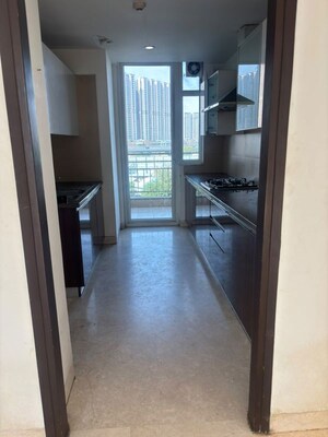 Kitchen in 3 BHK Apartment at Puri Diplomatic Greens Villas, Sector 111 – for Rent