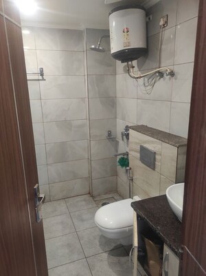 Bathroom in 2 BHK Apartment at Unitech Uniworld Gardens 2, Sector 47 – for Rent