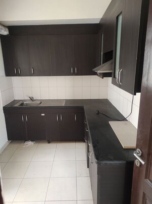 Kitchen in 2 BHK Apartment at Unitech Uniworld Gardens 2, Sector 47 – for Rent