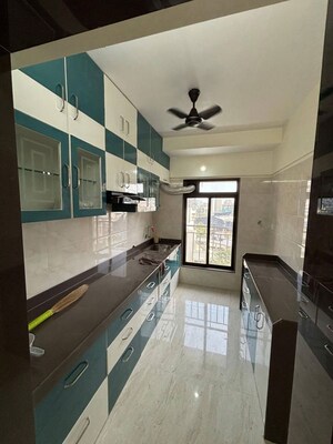 Kitchen in 2 BHK Apartment at Chaitanya Anand Lunkhod CHSL, Andheri West – for Rent