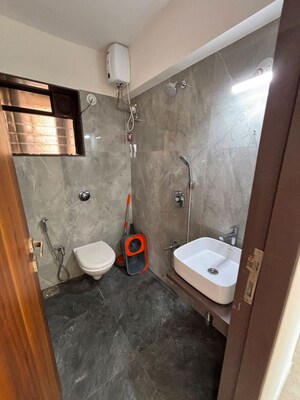 Bathroom in 2 BHK Apartment at Chaitanya Anand Lunkhod CHSL, Andheri West – for Rent