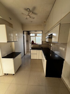 Kitchen in 2.5 BHK Apartment at Heranadani Meadows Gemini, Ghodbunder Road – for Rent