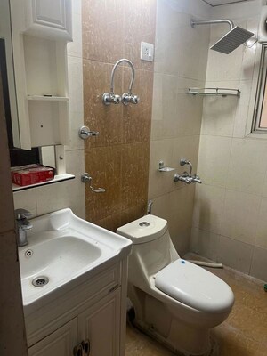 Bathroom in 3 BHK Apartment at Supertech Czar Suites, Omicron I Greater Noida – for Rent