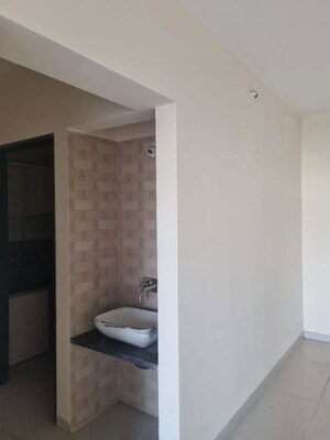 Bathroom in 1 BHK Apartment at Raunak Unnathi Woods Phase 7 A And B, Ghodbunder Road – for Rent
