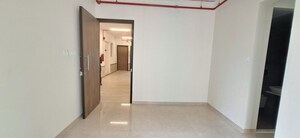 Living Room in 1.5 BHK Apartment at Dosti Tulip, Balkum Pada – for Rent