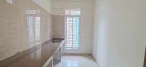 Kitchen in 1.5 BHK Apartment at Dosti Tulip, Balkum Pada – for Rent