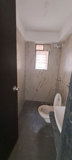 Bathroom in 2 BHK Apartment at Tharwani Millennium City, Badlapur East – for Sale