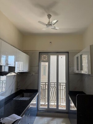 Kitchen in 3 BHK Apartment at Paradise Sai World Empire, Kharghar – for Rent
