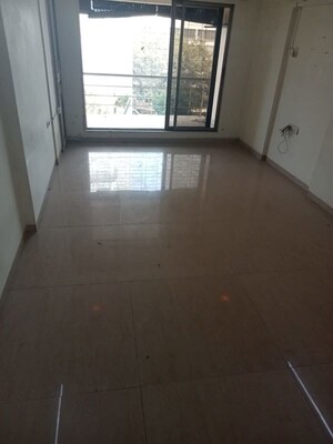 Room in 2 BHK Apartment at Greenfield CHS, Santacruz West – for Sale