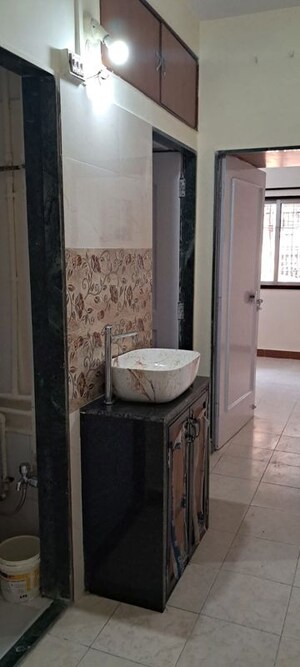 Bathroom in 1 BHK Apartment at Urja Sankalp CHS, Malad East – for Rent
