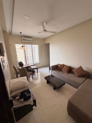 Living Room in 2 BHK Apartment at JP Unity Tower, Lower Parel – for Rent
