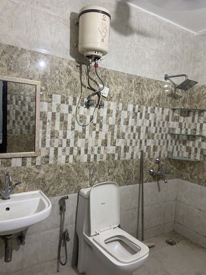 Bathroom in 2 BHK Builder Floor at Dharam Colony – for Rent