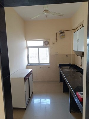 Kitchen in 2 BHK Apartment at Kalpataru Hills, Manpada – for Rent