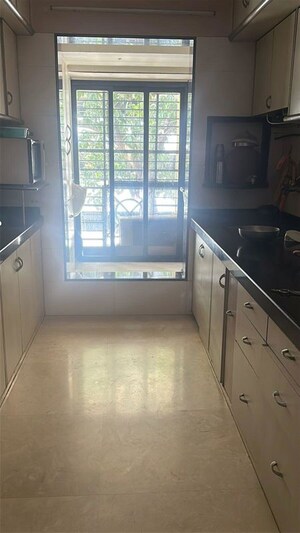 Kitchen in 3 BHK Apartment at New Swastik CHS, Matunga – for Rent