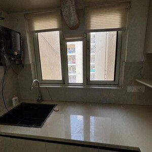 Kitchen in 3 BHK Builder Floor at Signature Global City 93, Sector 93 – for Rent