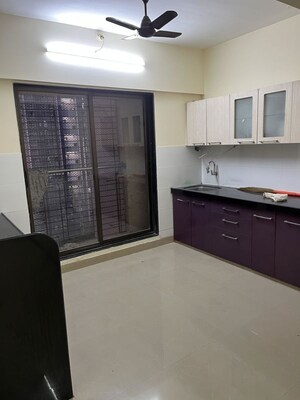 Kitchen in 2 BHK Apartment at Dwarkamai CHS, Matunga West – for Rent