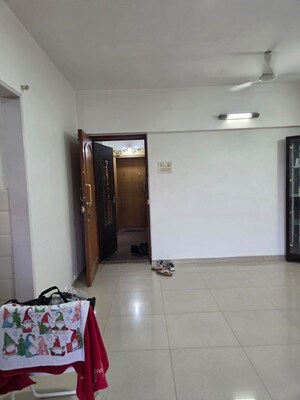 Living Room in 2 BHK Apartment at Bredco Viceroy Court, Kandivali East – for Sale