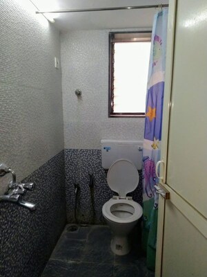 Bathroom in 2 BHK Apartment at Citizens CHS, Kandivali West – for Rent